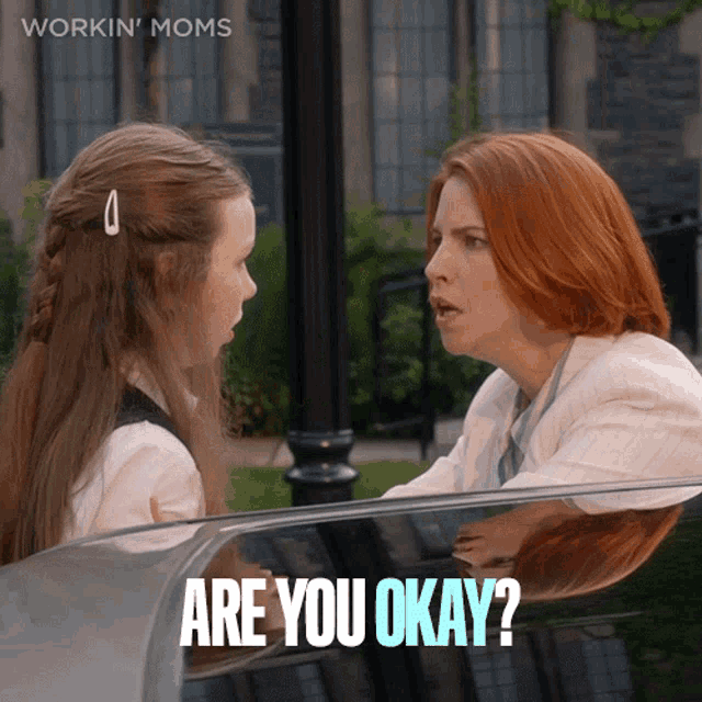 a woman talking to another woman with the words " are you okay "