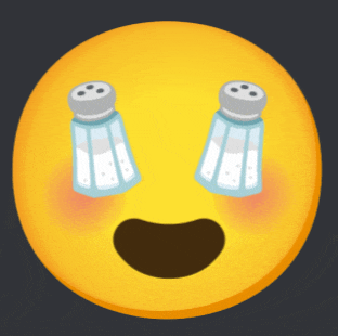 a yellow smiley face with salt and pepper shakers on it 's eyes