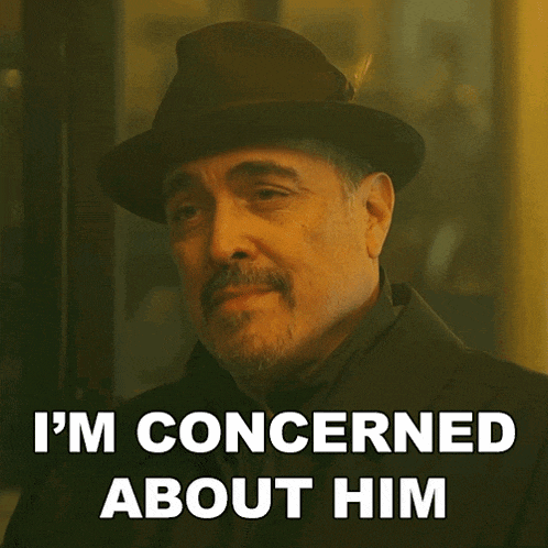 a man wearing a hat and a coat says i 'm concerned about him