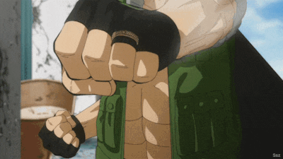 a close up of a person 's fist with the letters ssz on the bottom