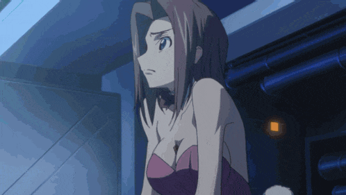 a woman in a pink dress is standing in a room