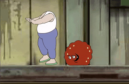 a cartoon of a man and a red ball with a face on it