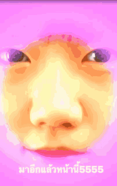 a girl in a floral dress has a foreign language written on the bottom of her face