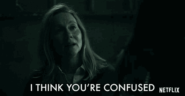 a woman says i think you 're confused in a dark room