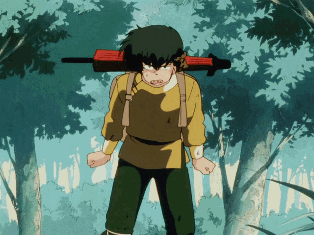 a man in a yellow shirt is carrying a red gun on his back