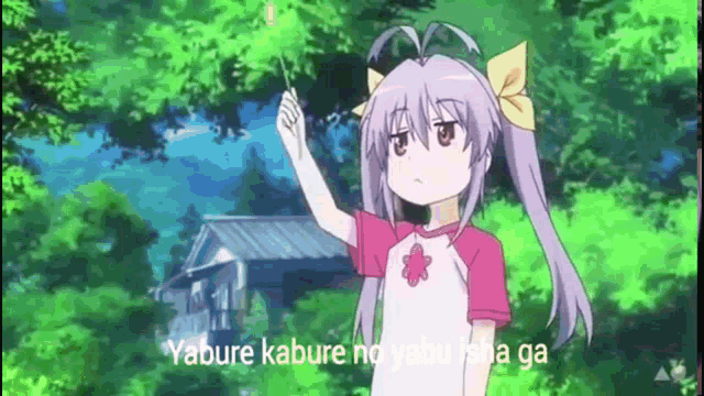 a girl with purple hair is standing in front of a house holding a flower .