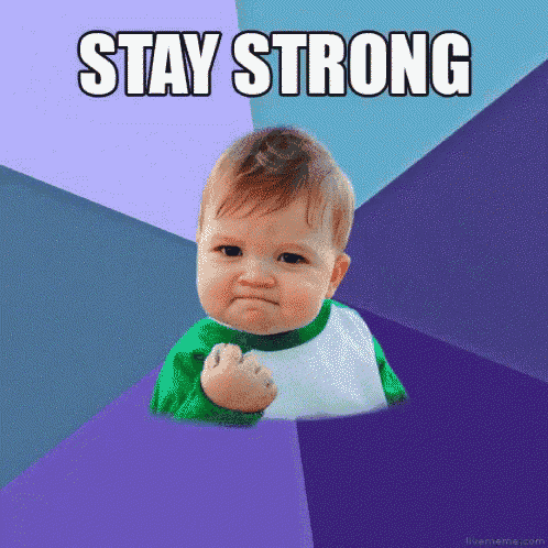 a baby with a fist in the air with the words stay strong above him