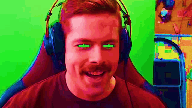 a man wearing headphones with green arrows pointing to his eyes is smiling