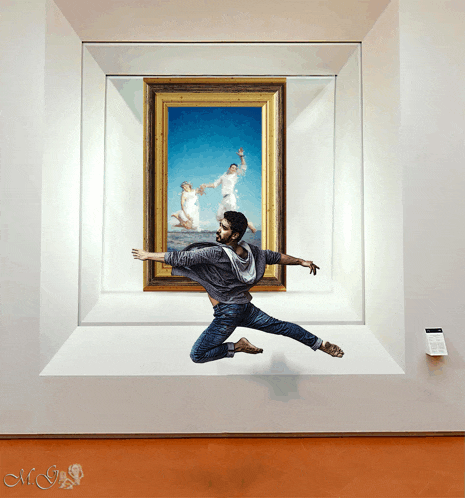 a man is jumping in front of a framed painting with the word mr on the bottom