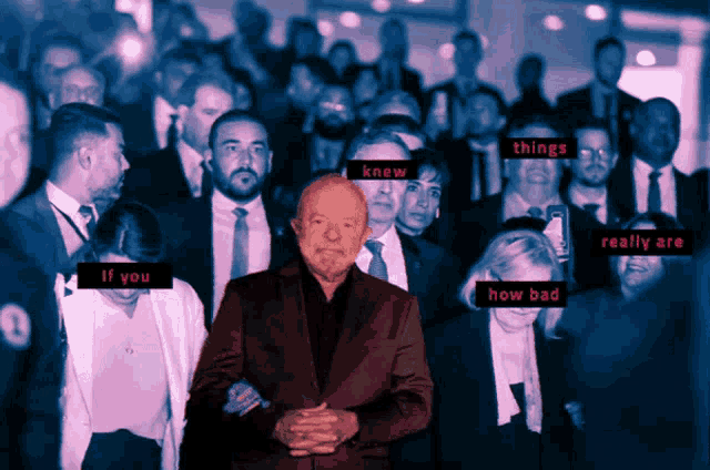 a man in a suit stands in front of a crowd of people with the words if you knew things really are how bad written in red