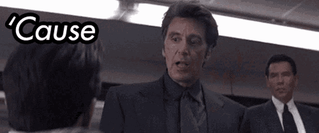 a man in a suit has the word cause above him