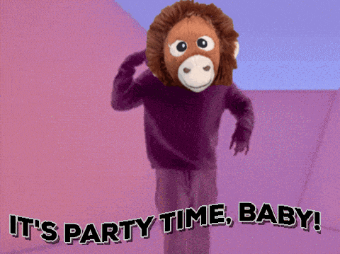 a stuffed monkey is sitting on a couch with the words it 's party time baby
