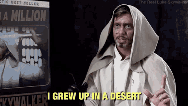 a man in a hooded cape with the words i grew up in a desert below him