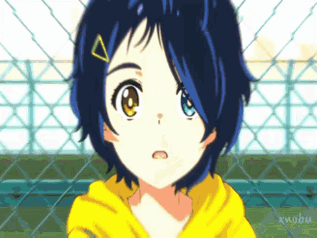 a girl with blue hair is wearing a yellow hoodie and has a triangle on her head