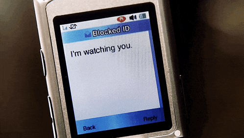 a cell phone with a message that says blocked id