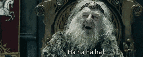 a man with a beard is sitting in a chair and laughing with the words ha ha ha ha
