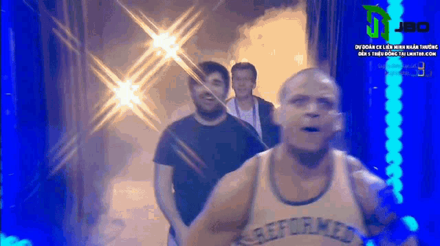 a man in a reformed jersey is walking through a dark tunnel