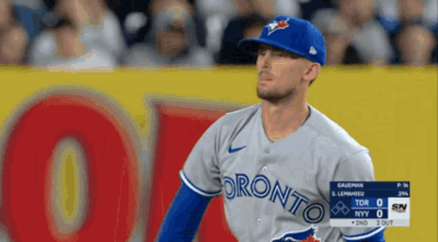 a baseball player for the toronto blue jays looks to his right