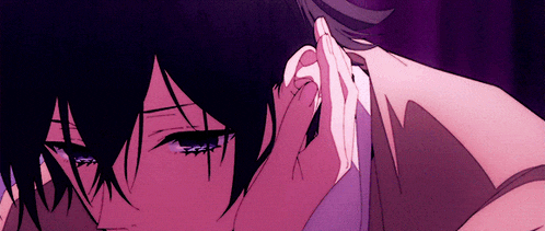 a close up of a person touching another person 's ear with a purple background