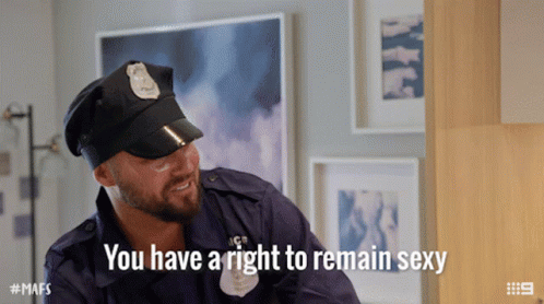 You Have A Right To Remain Sexy Cop GIF - You Have A Right To Remain Sexy Cop Officer GIFs