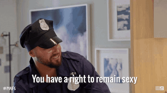 a man in a police uniform is saying you have a right to remain sexy