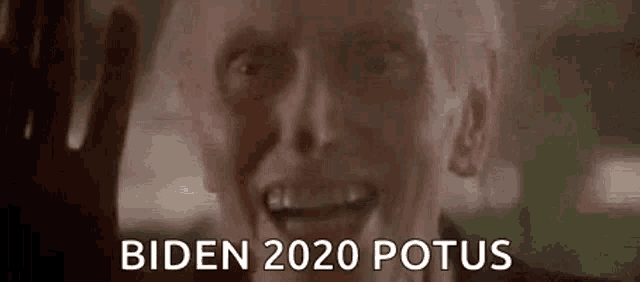 a close up of a man 's face with the words biden 2020 potus on it .