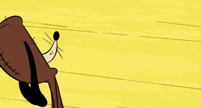 a cartoon character with stitches on his face is standing on a wooden floor