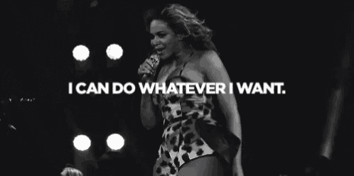 a woman is singing into a microphone with the words `` i can do whatever i want '' written above her .