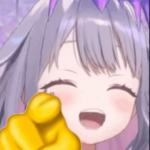 a close up of a girl with purple hair pointing at the camera .