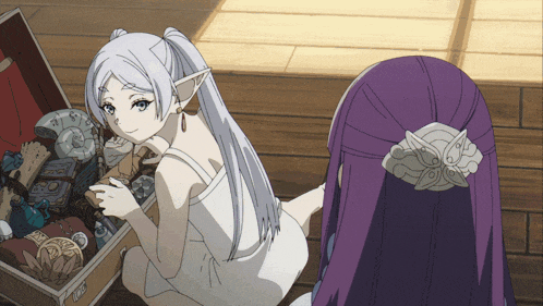 a girl with white hair is looking at something in a box