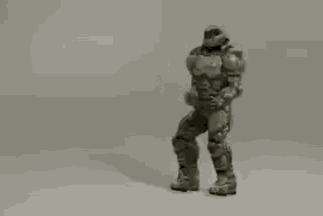 a video game character is standing on a white surface holding a sword .