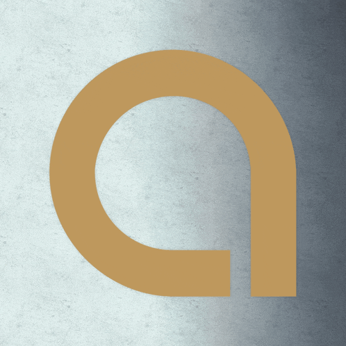 a gold letter a is against a gray background