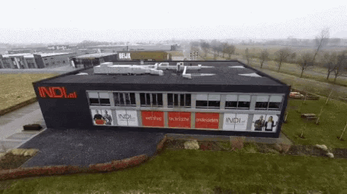 an aerial view of a large building that says indi