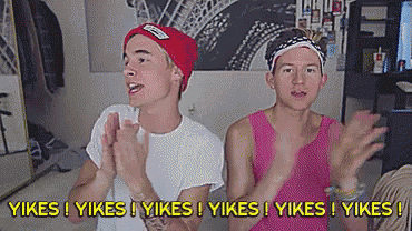 two young men are clapping in front of a picture of the eiffel tower and the words yikes yikes yikes