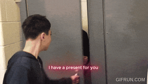 a man says i have a present for you behind a locker