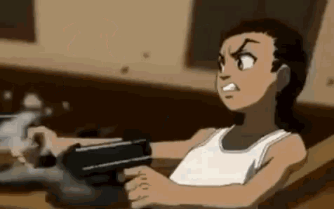 a cartoon character is holding a gun in his hand while sitting at a table .