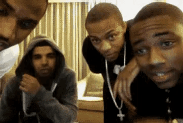 a group of young men are posing for a picture together