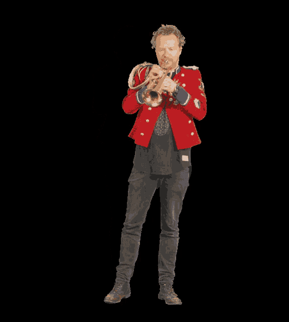 a man in a red jacket is playing a trumpet on a black background