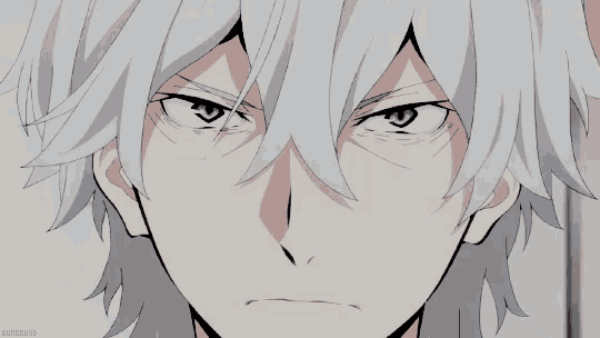 a close up of a person 's face with white hair and a blue eye