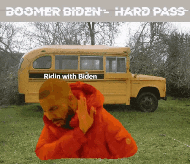 a man in an orange jacket stands in front of a yellow school bus that says ridin with biden