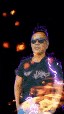 a man wearing sunglasses and a black shirt is surrounded by purple lightning