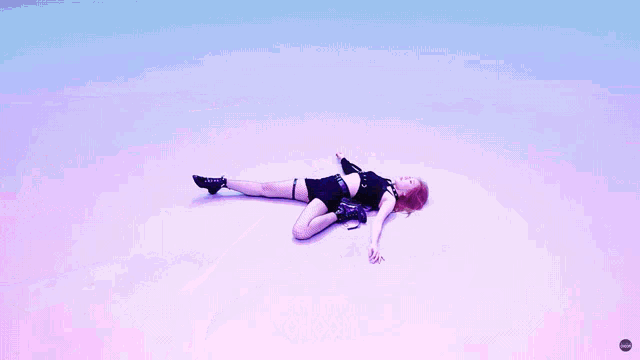 a woman laying on the floor with the word choom written on the bottom