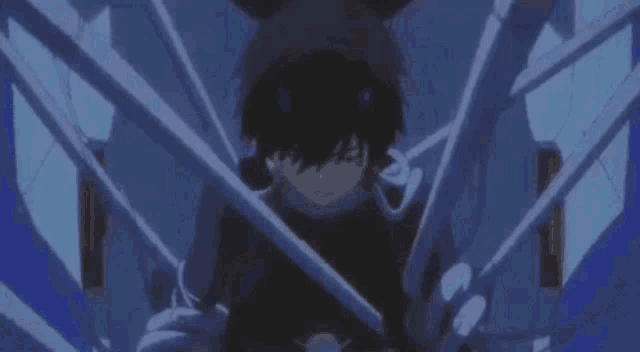 a boy is sitting in a chair with a spider web behind him .
