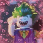 the joker from the lego movie is wearing a purple suit and tie and has green hair .