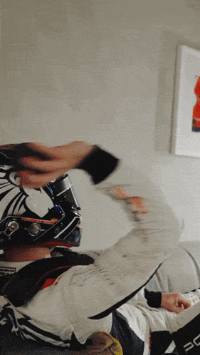 a person wearing a helmet that says ' a ' on it