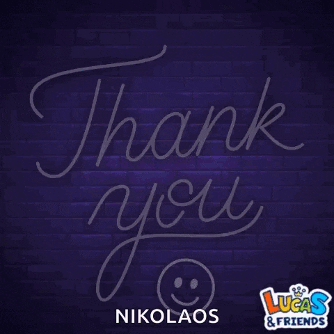 a neon sign that says `` thank you '' with a smiley face in the corner .
