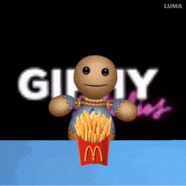 a doll is eating french fries in a mcdonald 's box