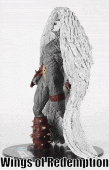 a statue of a man with wings of redemption written on the bottom