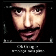 a close up of a man 's face with the words `` ok google amoleca meu pinto '' .