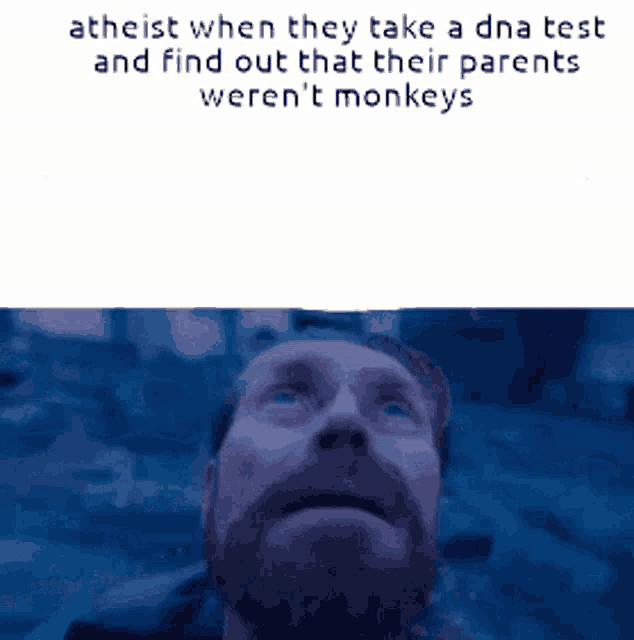 a man with a beard is looking up at the sky with a caption that says atheist